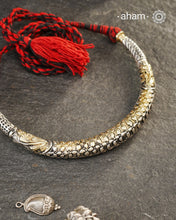 Handmade Chitai work 92.5 Sterling silver hasli.
Can be worn both ways and comes with adjustable thread for ease of wearing. A bestseller and a classic piece that has stood the test of time and is bound to become a family heirloom.