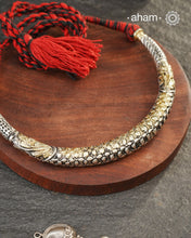 Handmade Chitai work 92.5 Sterling silver hasli.
Can be worn both ways and comes with adjustable thread for ease of wearing. A bestseller and a classic piece that has stood the test of time and is bound to become a family heirloom.