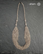 The Odhisa&nbsp;Sarson Mala&nbsp;is a masterful vintage creation that embodies both heritage and symbolism.

Featuring multiple strands of delicately crafted &nbsp;mustard/Sarson&nbsp;shaped silver beads, this neckpiece reflects the cultural traditions of the Kutia Kondh tribals of Odisha, for whom these forms represent prosperity, fertility, and abundance.

