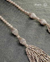 The Odhisa&nbsp;Sarson Mala&nbsp;is a masterful vintage creation that embodies both heritage and symbolism.

Featuring multiple strands of delicately crafted &nbsp;mustard/Sarson&nbsp;shaped silver beads, this neckpiece reflects the cultural traditions of the Kutia Kondh tribals of Odisha, for whom these forms represent prosperity, fertility, and abundance.


