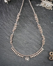 Rooted in the living traditions of Odisha’s tribe, this rare Odhia neckpiece is a celebration of tribal artistry preserved through generations. Crafted in authentic silver and traditionally strung on cotton thread, each bead is meticulously hand-worked using age-old techniques passed down by master artisans.

See the detailing of every element. The beautiful ambi shaped beads in two different sizes and the intricately details beads, all crafted in high grade silve.&nbsp; &nbsp;Every element of the neckpiece