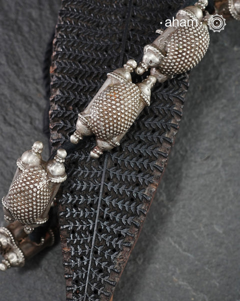 For those who enjoy and appreciate traditional tribal pieces, this one is for you. A beautiful statement neckpiece with chunky amulets threaded together on cotton string. A stunning piece this one is.