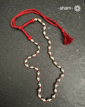 Silver Dholki/ Wax Beads coated with silver foil with Maroon adjustable thread. Also known as Bor Mala