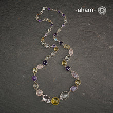 Silver Neckpiece with Semi Precious Stones in 92.5 silver bezel setting and gold polish.
Works great with work wear or even your evening dress.