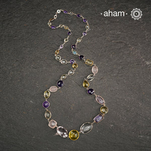 Silver Neckpiece with Semi Precious Stones in 92.5 silver bezel setting and gold polish.
Works great with work wear or even your evening dress.