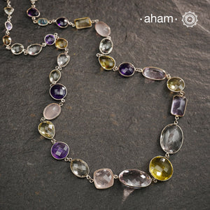 Silver Neckpiece with Semi Precious Stones in 92.5 silver bezel setting and gold polish.
Works great with work wear or even your evening dress.