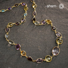 Silver Neckpiece with Semi Precious Stones set in 92.5 silver with gold polish.Works great with work wear or even your evening dress.