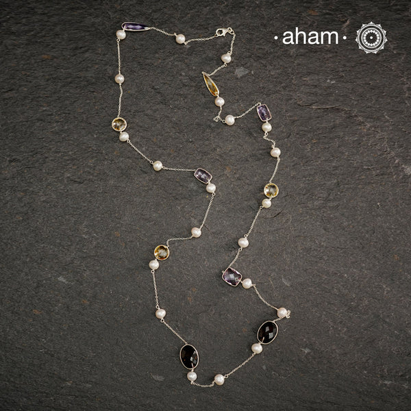 Silver Neckpiece with Semi Precious Stones in bezel setting and pearls.&nbsp;
Works great with work wear or even your evening dress.