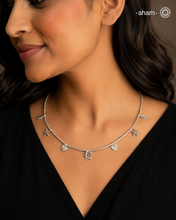 Stunning silver neckpiece with little charms. All crafted in 92.5 silver.
Works great with work wear or even your evening dress.