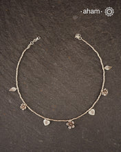 Stunning silver neckpiece with little charms. All crafted in 92.5 silver.&nbsp;
Works great with work wear or even your evening dress.