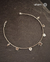 Stunning silver neckpiece with little charms. All crafted in 92.5 silver.&nbsp;
Works great with work wear or even your evening dress.
