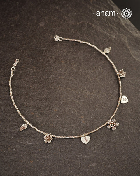 Stunning silver neckpiece with little charms. All crafted in 92.5 silver.&nbsp;
Works great with work wear or even your evening dress.