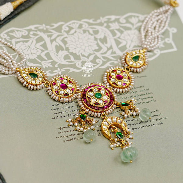 Make a sophisticated style statement this festive season. Crafted using traditional Kundan Jadua techniques in 92.5 silver with gold polish, semi precious stones and cultured pearls. Perfect for intimate weddings and upcoming festive celebrations.