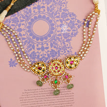 This beautiful handcrafted gold polish sterling silver choker is a perfect choice for special occasions. Featuring a Moghul inspired semi-precious gem setting with Kundan and pearl work, its intricate details make it a memorable piece of jewellery. Ideal for festive occasions, it is sure to be an eye-catcher.