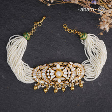 Embrace the allure of timeless elegance with Aham Jewellery’s latest Mother of Pearl collection, a radiant choice for festive celebrations and weddings.

The choker is crafted in 92.5 silver and adorned with a luxurious gold polish, capturing the iridescent beauty of mother of pearl.