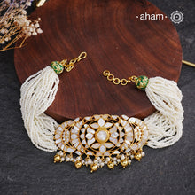 Embrace the allure of timeless elegance with Aham Jewellery’s latest Mother of Pearl collection, a radiant choice for festive celebrations and weddings.

The choker is crafted in 92.5 silver and adorned with a luxurious gold polish, capturing the iridescent beauty of mother of pearl.