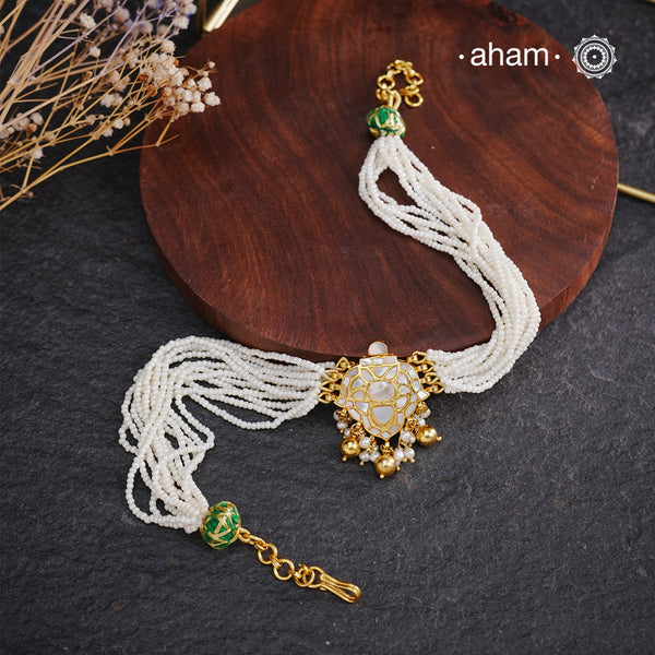 Embrace the allure of timeless elegance with Aham Jewellery’s latest Mother of Pearl collection, a radiant choice for festive celebrations and weddings.

The Neckpiece is crafted in 92.5 silver and adorned with a luxurious gold polish, capturing the iridescent beauty of mother of pearl. You can wear this versatile piece like a choker or also below the neck.