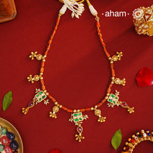 Experience timeless elegance with our Gold Polish Silver Neckpiece. Crafted with raw coral beads and intricate kundan tukdis, this short neckpiece exudes subtle charm. Its traditional design crafted in silver and shining gold polish make it a beautiful addition to any jewellery lovers collection. Indulge in eternal style with our everygreen neckpiece.