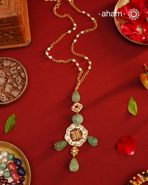 Indulge in the perfect blend of traditional and modern with our Kundan Gold Polish Silver Neckpiece. Designed for versatility, this 92.5 silver neckpiece features a stunning gold polish and elegant stone drops. Make a statement with this magnificent piece of art that will elevate any outfit.