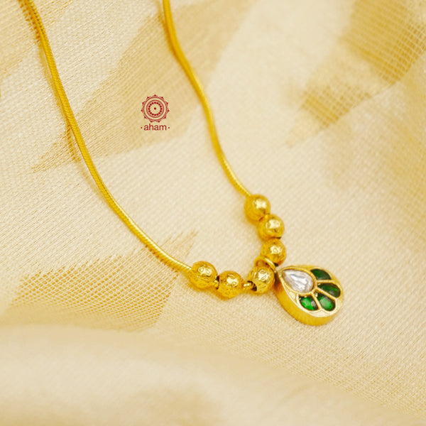 This exquisite silver necklace dipped in gold is handcrafted with gorgeous kundan work. Its lightweight design makes it perfect for family events and festivities.  