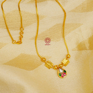 This exquisite silver necklace dipped in gold is handcrafted with gorgeous kundan work. Its lightweight design makes it perfect for family events and festivities.  