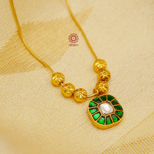 This exquisite silver necklace dipped in gold is handcrafted with gorgeous kundan work. Its lightweight design makes it perfect for family events and festivities.