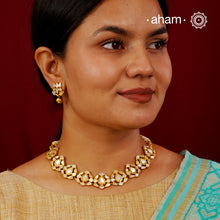 Embrace the allure of timeless elegance with Aham Jewellery’s latest Mother of Pearl collection, a radiant choice for festive celebrations and weddings.

The neckpiece is crafted in 92.5 silver and adorned with a luxurious gold polish, capturing the iridescent beauty of mother of pearl. You can wear this versatile piece like a choker or below the neck and even as a mathapati. 
