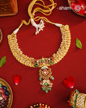 The classic kasu mala - coin neckpiece that never goes out of style. Crafted in 92.5 silver with gold polish. Exquisitely elegant, the heritage collection features traditional motifs and intricate&nbsp; workmanship on gold-plated silver jewellery, a reflection of the rich culture of India. This collection is perfect for brides and bridesmaids.