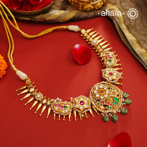 Expertly crafted for your special days, the Kundan Gold Polish Silver Neckpiece is a timeless addition to your wedding ensemble. Made with 92.5 silver and adorned with intricate kundan and pearl work, this neckpiece adds a touch of elegance to any outfit. Elevate your style with this exquisite piece.