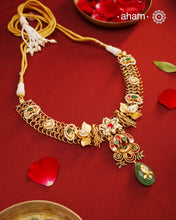 This hand made neckpiece is a modern twist on traditional designs. Crafted with 92.5 silver and adorned with stunning kundan work, its gold polish adds a touch of elegance. The beautiful green drop completes the look, showcasing expert traditional craftsmanship.