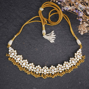 Embrace the allure of timeless elegance with Aham Jewellery’s latest Mother of Pearl collection, a radiant choice for festive celebrations and weddings.
The Neckpiece is crafted in 92.5 silver and adorned with a luxurious gold polish, capturing the iridescent beauty of mother of pearl. You can wear this versatile piece like a choker or a around the neck piece.
This collection is designed with festivities, bridesmaids, and destination weddings in mind, offering a versatile blend of tradition and contemporary