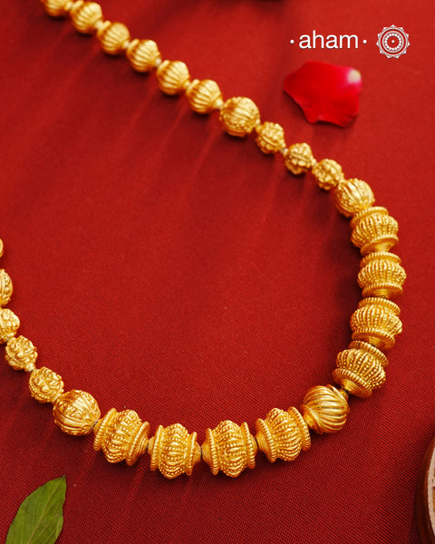 Beautiful silver beaded mala with gold polish. Light weight and very versatile to wear with your Indian clothes.