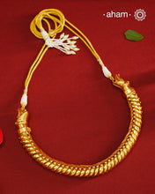 This elegant Sutlada silver neckpiece with gold polish is the epitome of timeless style. Crafted with traditional techniques, it exudes sophistication and class. Perfect for any occasion, this neckpiece is a must-have for those who appreciate timeless beauty.