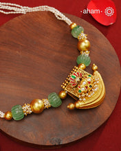Elevate your style with our Gold Polish Amulet Silver Neckpiece. Crafted in silver and dipped in lustrous gold polish, this beautiful neckpiece features amulet with kundan work and semi-precious stones mala. Make an elegant statement with this stunning accessory.