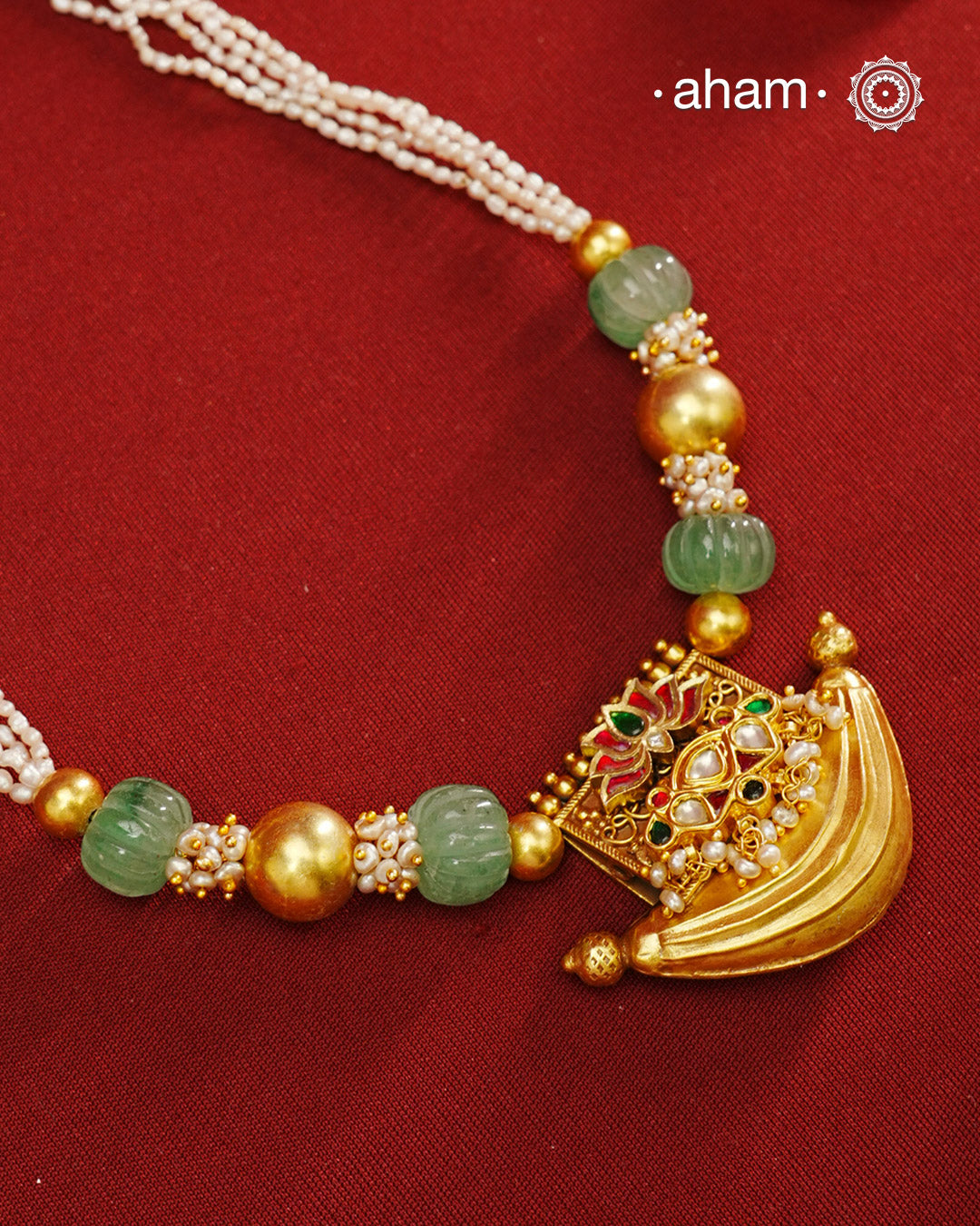 Elevate your style with our Gold Polish Amulet Silver Neckpiece. Crafted in silver and dipped in lustrous gold polish, this beautiful neckpiece features amulet with kundan work and semi-precious stones mala. Make an elegant statement with this stunning accessory.
