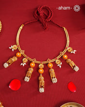 Traditional south Indian Jewellery motifs reimagined in a contemporary form along with coral and pearls. Crafted in 92.5 silver and dipped in beautiful gold polish.&nbsp;