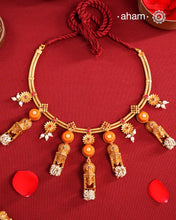 Traditional south Indian Jewellery motifs reimagined in a contemporary form along with coral and pearls. Crafted in 92.5 silver and dipped in beautiful gold polish.&nbsp;