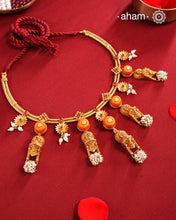 Traditional south Indian Jewellery motifs reimagined in a contemporary form along with coral and pearls. Crafted in 92.5 silver and dipped in beautiful gold polish.