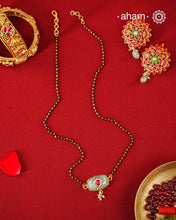 Minimal, elegant, and thoughtfully detailed, this gold-polished silver mangalsutra is designed for the contemporary woman.