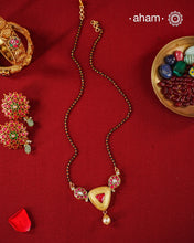 A gold-polished silver mangalsutra that is minimal in design, yet rich in fine detailing—crafted to complement modern aesthetics.