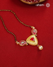 A gold-polished silver mangalsutra that is minimal in design, yet rich in fine detailing—crafted to complement modern aesthetics.