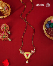 A gold-polished silver mangalsutra that is minimal in design, yet rich in fine detailing—crafted to complement modern aesthetics.