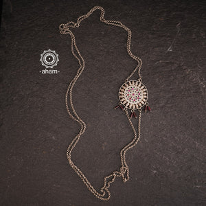 This stunning silver neckpiece features a vintage haathphool with beautiful chiali work, converted into a lightweight MOP chain that can be worn on one side. Perfect for adding a touch of elegance to any outfit.