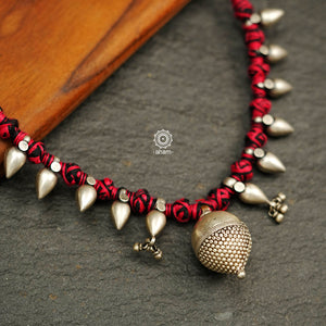 Tribal Borla Silver Neckpiece with adjustable thread.  The Rajasthani Borla - Mangtika along with beautiful trinket silver pieces has been given a new twist by threading them into a beautiful unique short neckpiece. Perfect piece to wear this Navratri. 