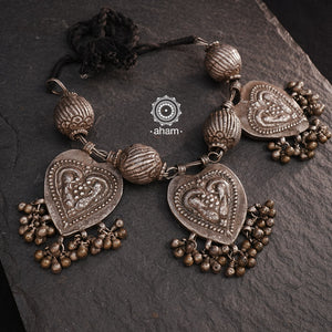 For those who enjoy and appreciate traditional tribal pieces, this one is for you. A beautiful statement neckpiece with heart shaped pendants with peacock motifs on them along side some big vintage beads and ghungroos. A stunning piece this one is.