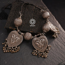 For those who enjoy and appreciate traditional tribal pieces, this one is for you. A beautiful statement neckpiece with heart shaped pendants with peacock motifs on them along side some big vintage beads and ghungroos. A stunning piece this one is.