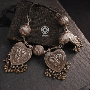 For those who enjoy and appreciate traditional tribal pieces, this one is for you. A beautiful statement neckpiece with heart shaped pendants with peacock motifs on them along side some big vintage beads and ghungroos. A stunning piece this one is.