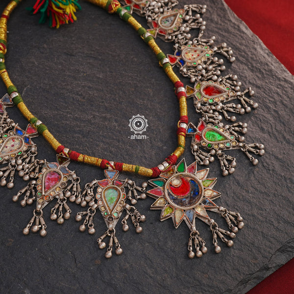 Tribal Silver Glass Neckpiece from Saharanpur, Uttar Pradesh. 
This gorgeous piece has multiple glass pieces strung together on a cotton thread. 
