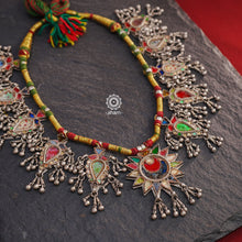 Tribal Silver Glass Neckpiece from Saharanpur, Uttar Pradesh. 
This gorgeous piece has multiple glass pieces strung together on a cotton thread. 
