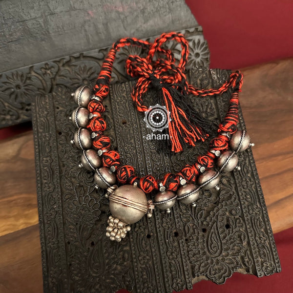 Tribal Borla Silver Neckpiece with adjustable thread.  The Rajasthani Borla - Mangtika along with beautiful trinket silver beads has been given a new twist by threading them into a beautiful unique short neckpiece. A perfect, unique piece to wear with your ethnic wear.  